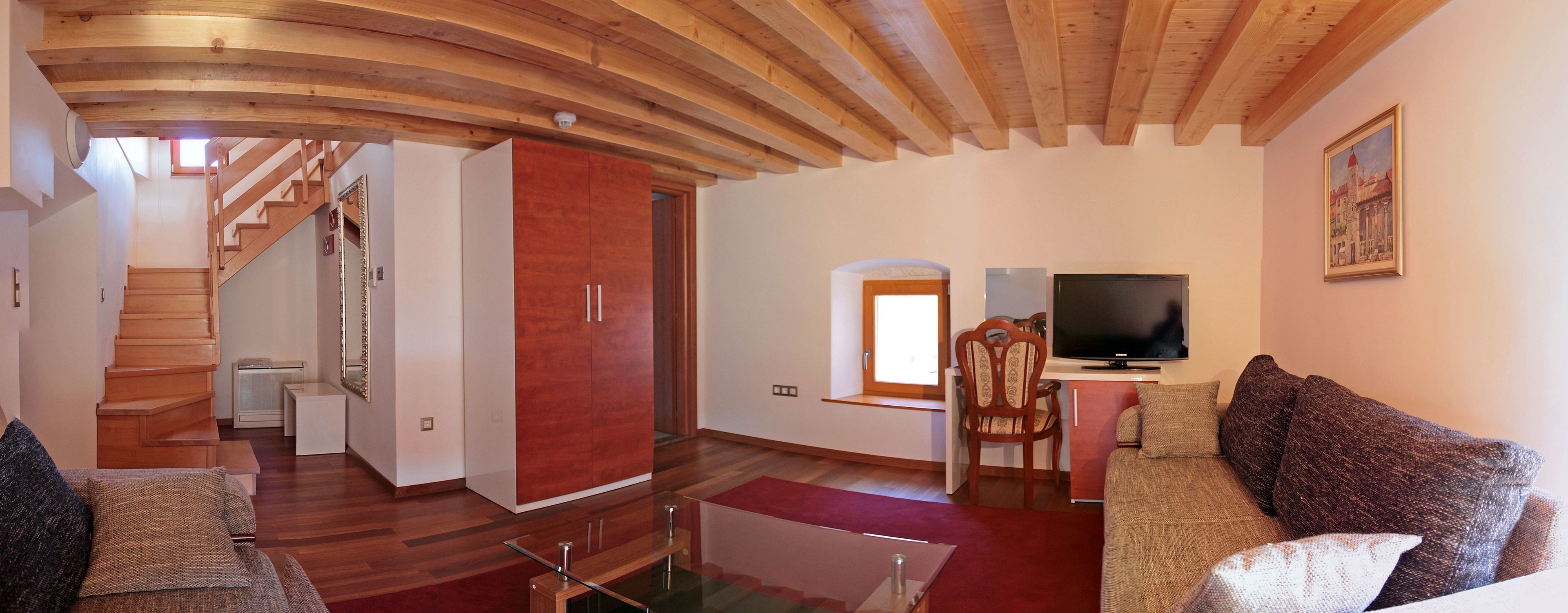 family suite | living area | 32-inch lcd tv with satellite channels, tv