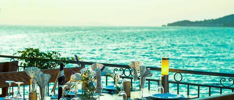 Breakfast, lunch, dinner served; Mediterranean cuisine, beach views