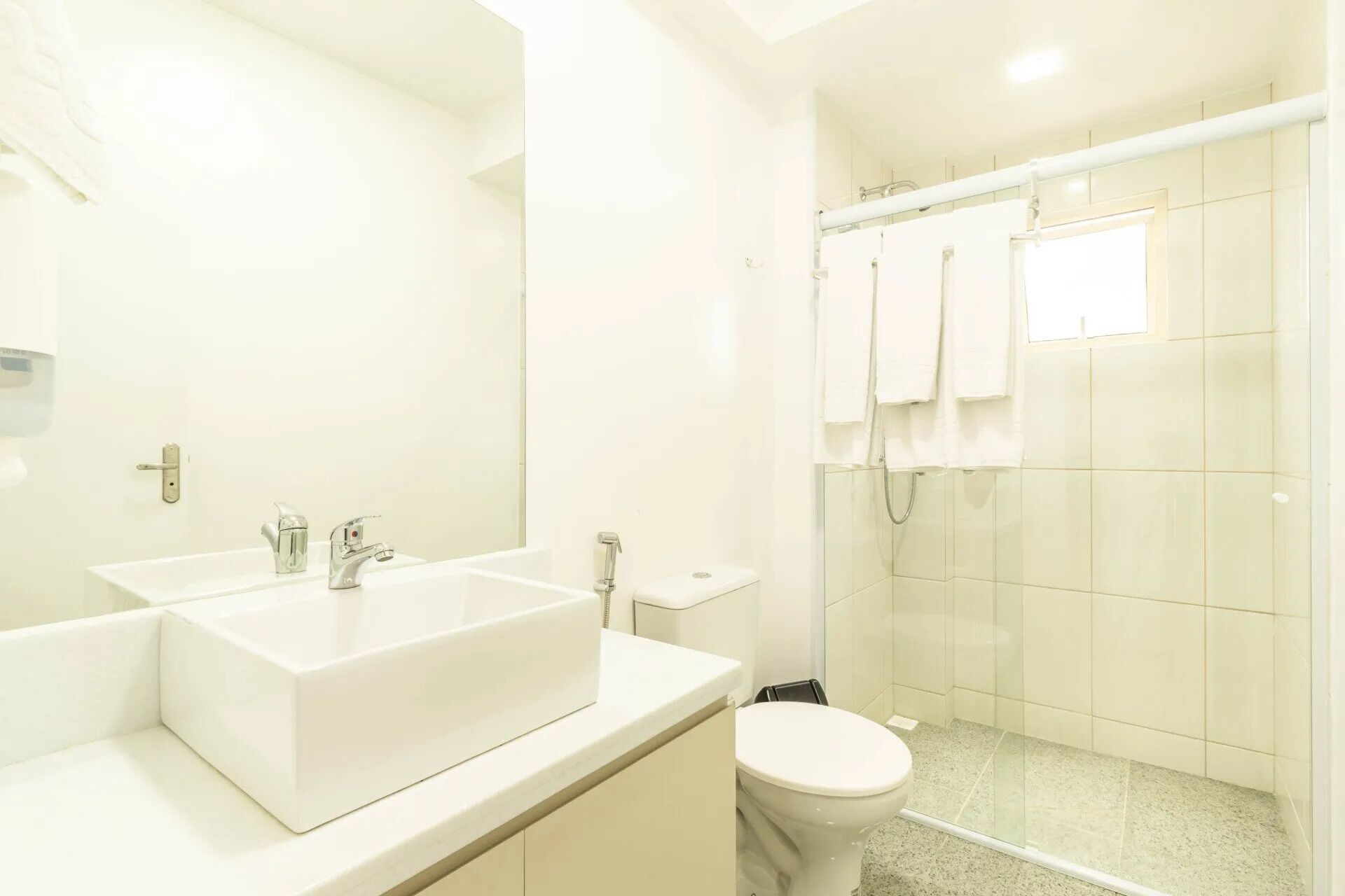 deluxe triple room | bathroom | shower, free toiletries, bidet, towels