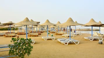 Private beach, free beach shuttle, sun-loungers, beach umbrellas
