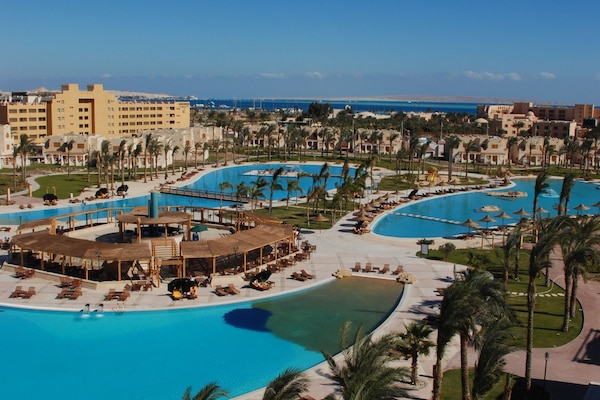 Outdoor pool, pool umbrellas, sun loungers