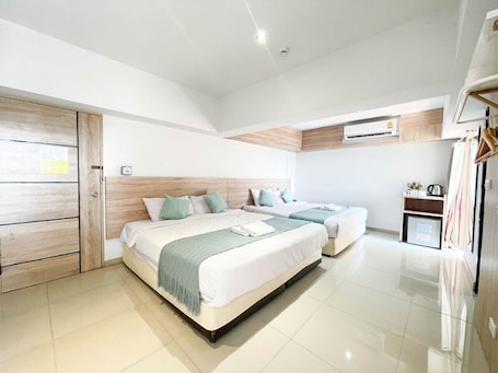Family Room, 2 King Beds | Blackout drapes, free WiFi, bed sheets, wheelchair access