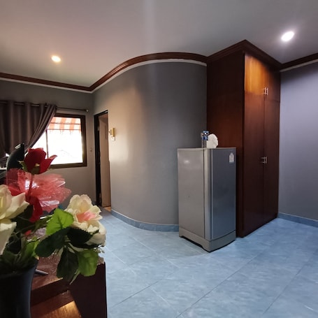 Junior Triple Room, 1 Bedroom, Kitchenette, Garden Area | Hypo-allergenic bedding, in-room safe, desk, laptop workspace. The Guest House