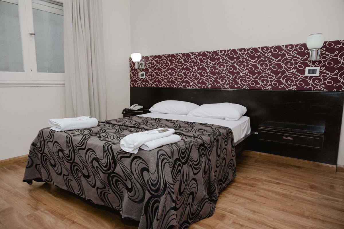 Down comforters, pillowtop beds, in-room safe, desk