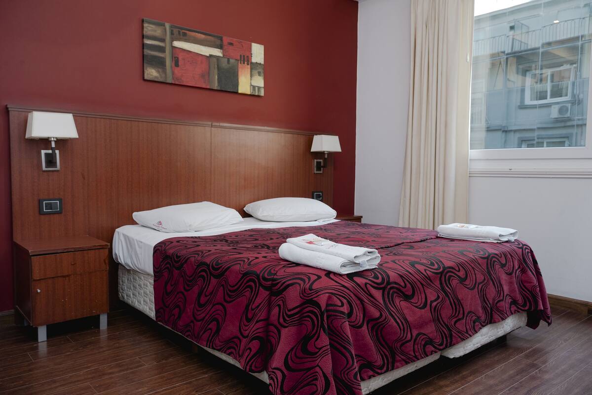Down comforters, pillowtop beds, in-room safe, desk