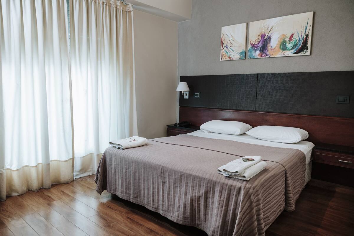 Down comforters, pillowtop beds, in-room safe, desk