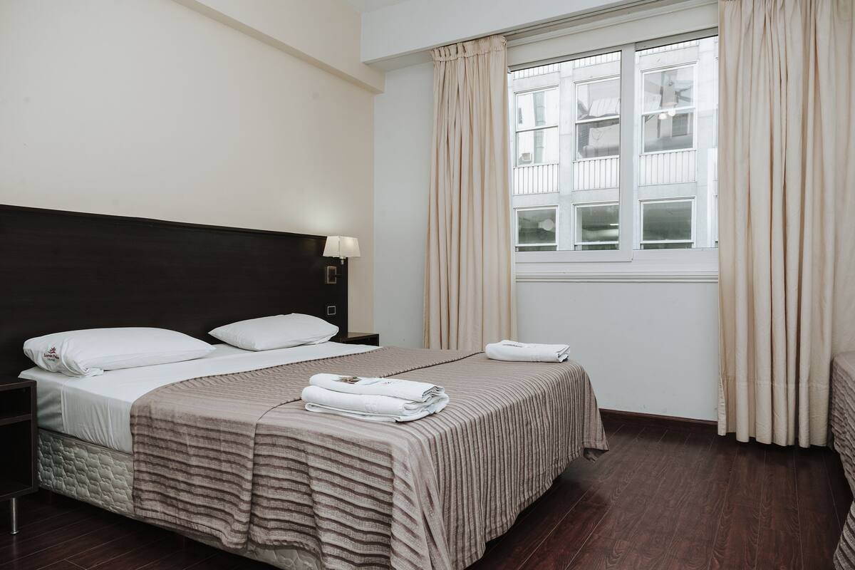 Down comforters, pillowtop beds, in-room safe, desk