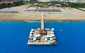 Private beach, free beach shuttle, beach cabanas, sun-loungers - Ramada Resort by Wyndham Lara (Antalya)
