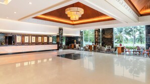 A spacious lobby with a polished floor, a reception desk, and seating areas. - Swiss-Belhotel Danum Palangkaraya (Palangkaraya)