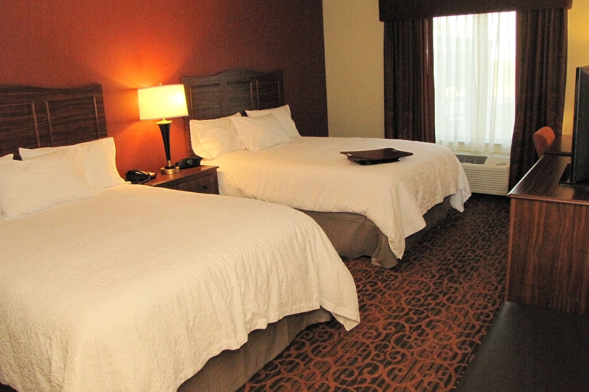 desk, blackout curtains, iron/ironing board, cots/infant beds