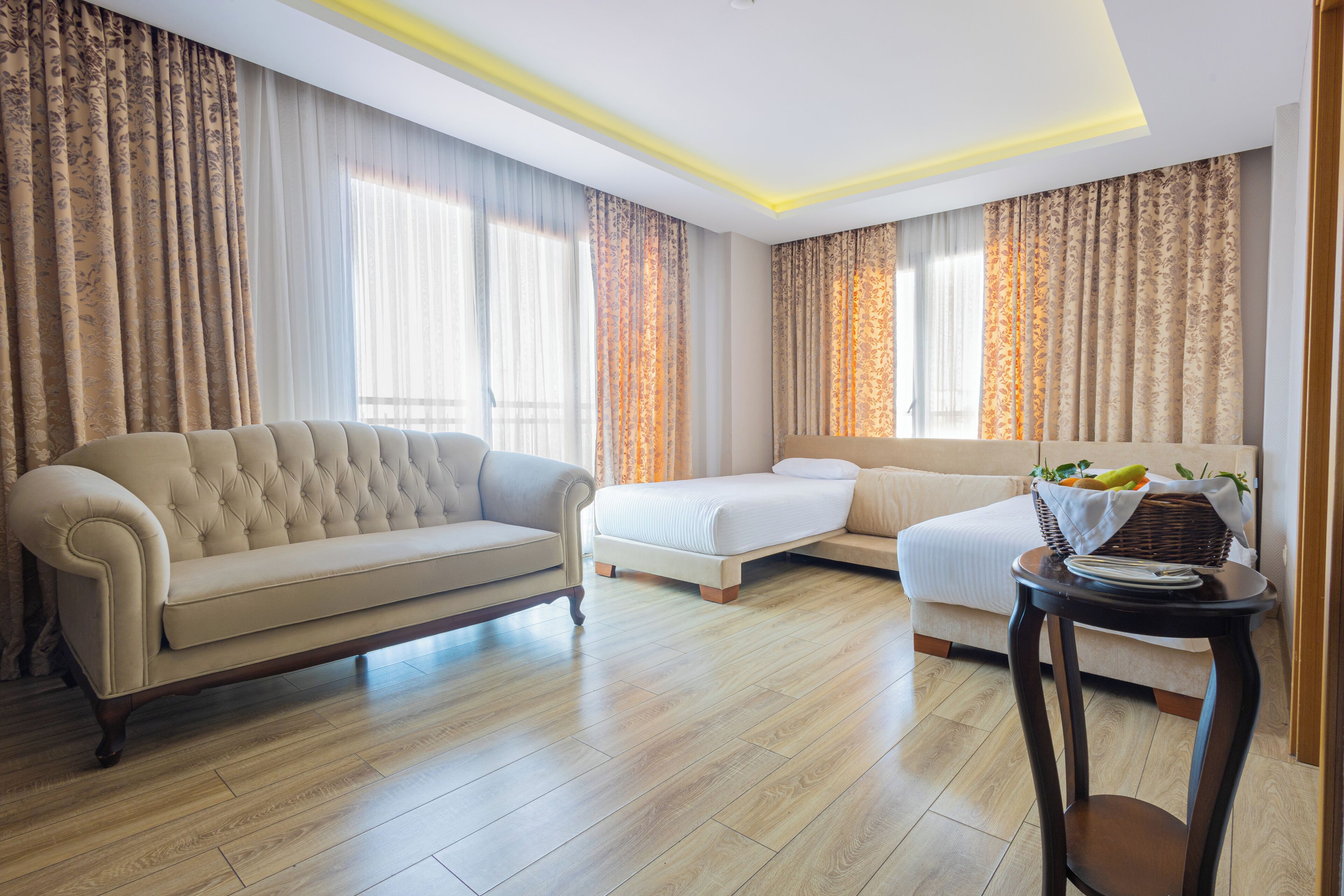 family suite, sea view | minibar, in-room safe, desk, laptop workspace