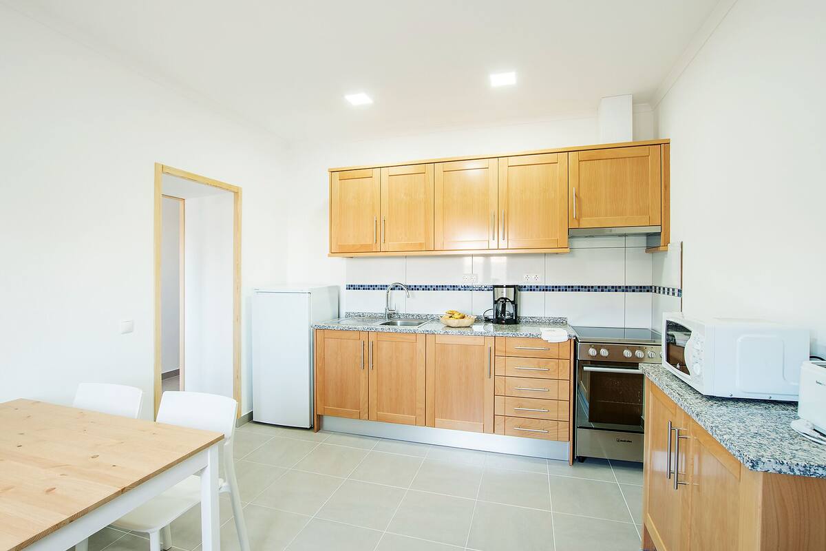 basic shared dormitory | living area | flat-screen tv