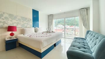 Habitación Deluxe | Minibar, caja fuerte, wifi gratis y ropa de cama