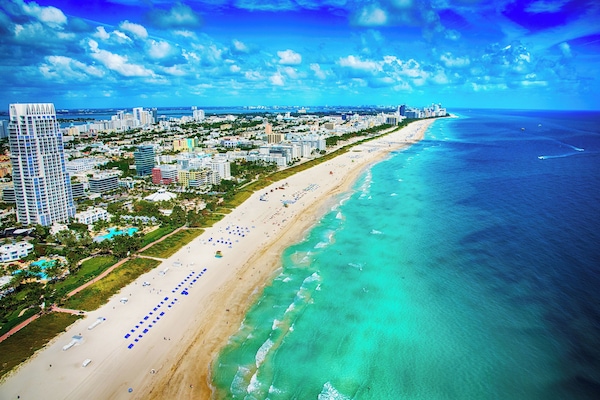 Beach nearby, white sand, sun loungers, beach umbrellas
