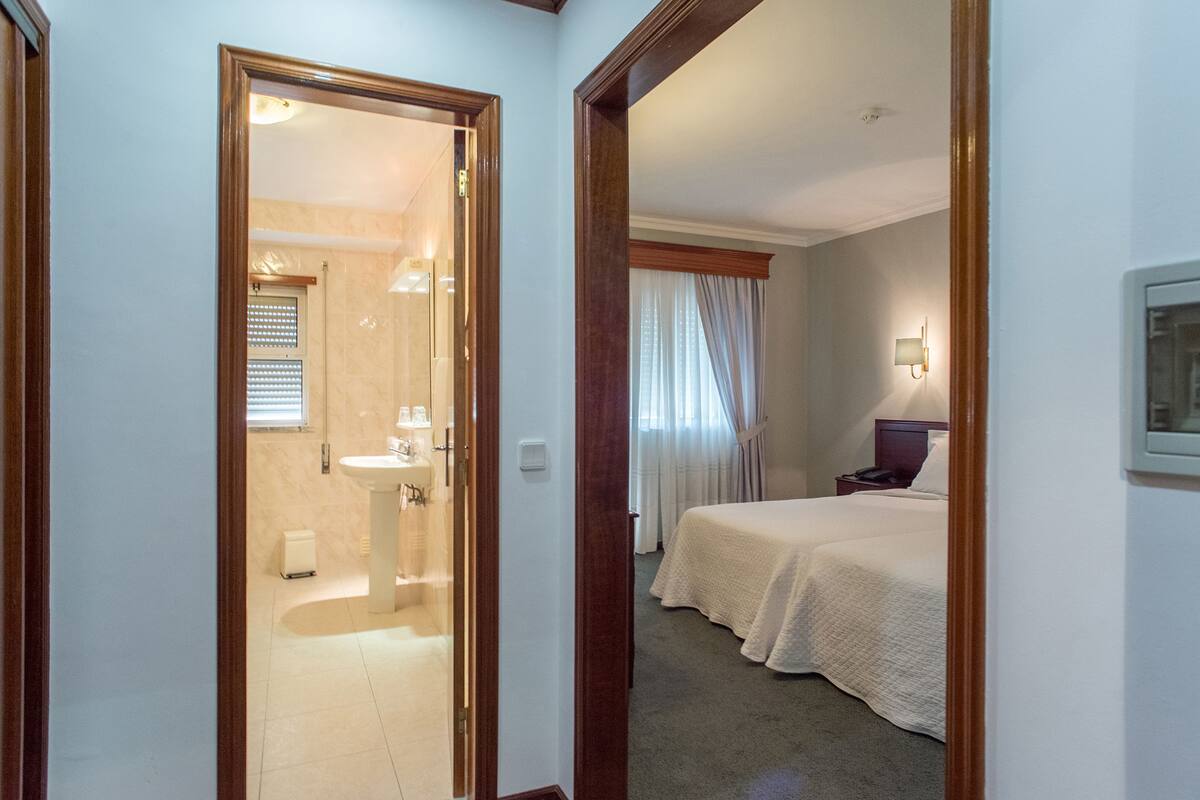 basic double or twin room, 1 bedroom, lanai, poolside | bathroom | free toiletries, hair dryer, bidet, towels