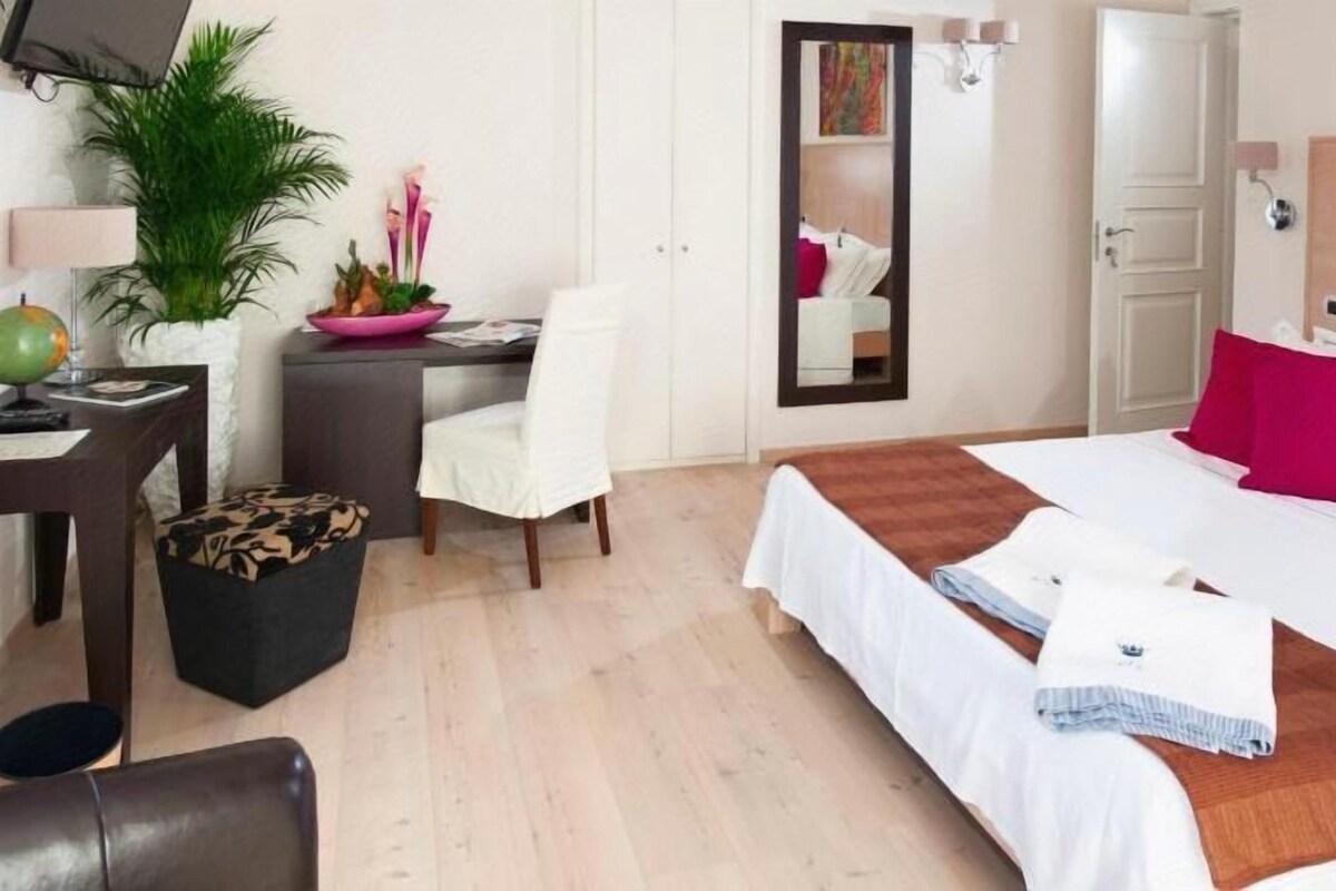 Ropa de cama de alta calidad y minibar 