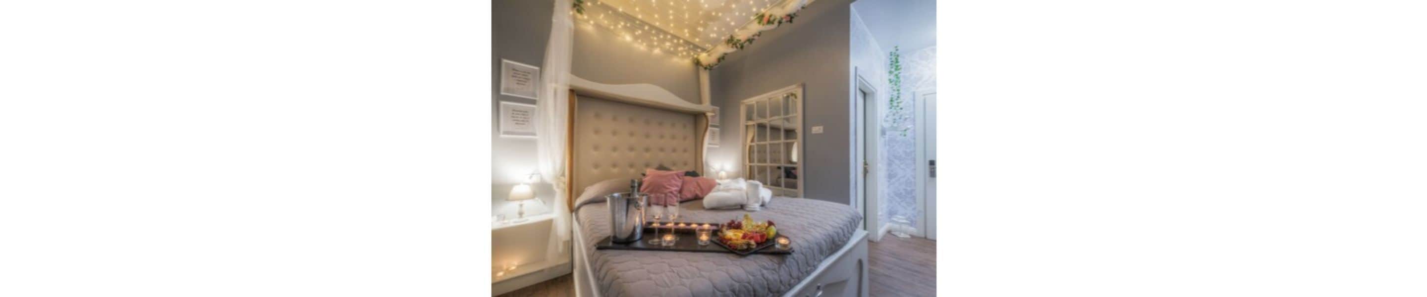 Romantisches Zimmer, 1 Doppelbett, Whirlpool | Individuell eingerichtet, Verdunkelungsvorhänge, schallisolierte Zimmer