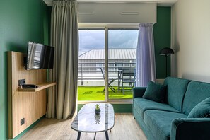 Comfort Apartment, 2 Bedrooms | Living area | Flat-screen TV