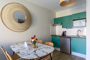 Comfort Apartment, 1 Bedroom | Private kitchen | Fridge, microwave, stovetop, coffee/tea maker - Appart Hôtel Le Liberté (Vannes)