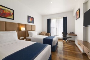 Deluxe kamer, 1 eenpersoonsbed, niet-roken | Luxe beddengoed, bedden met traagschuimmatrassen, een minibar
