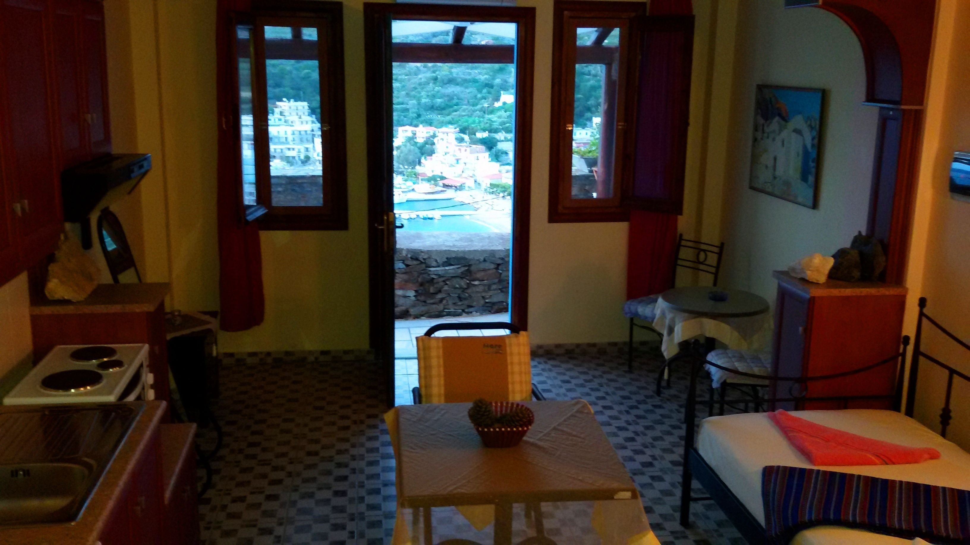 Standard Triple Room, Sea View | Living area | LCD TV