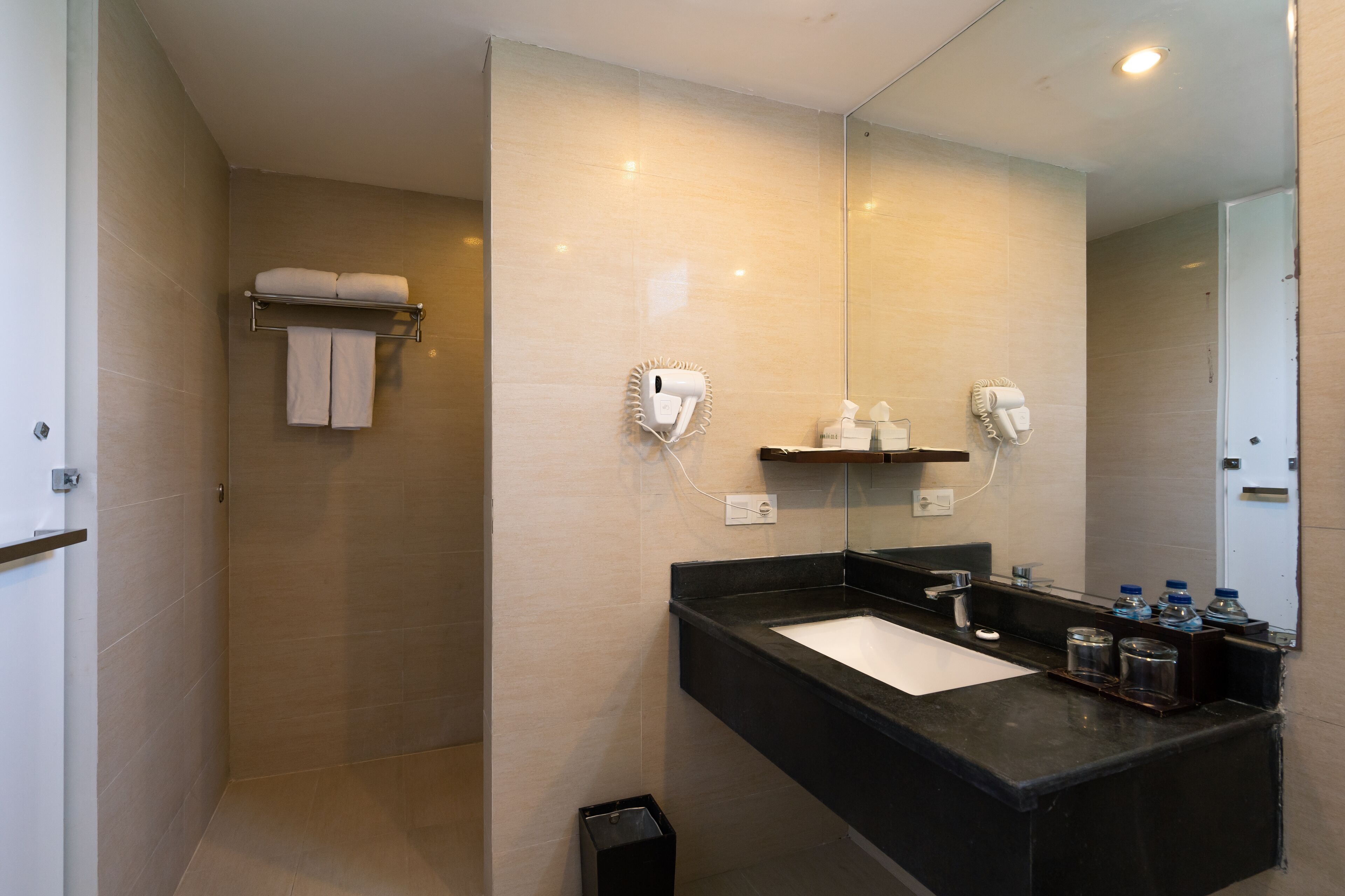 deluxe room | bathroom | free toiletries, hair dryer, slippers, towels