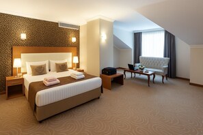 Ropa de cama de alta calidad y minibar 