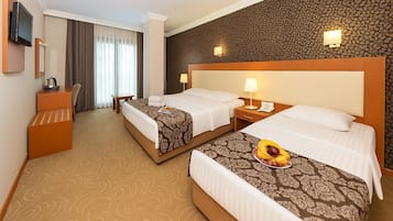 Hypo-allergenic bedding, minibar, in-room safe, desk