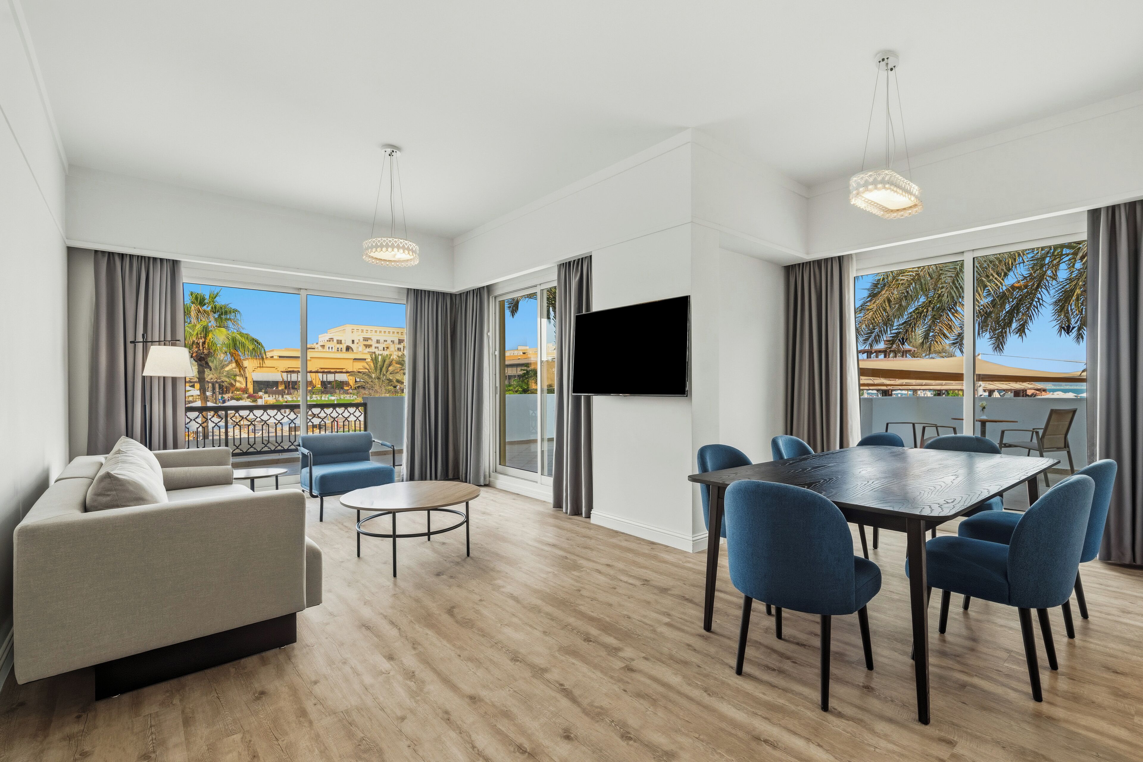 Senior Suite, 3 Bedrooms | Living area | 42-inch TV with satellite channels