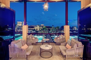 7 bars/lounges, 6 beach bars, poolside bar