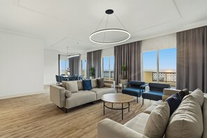 3 Bedroom King Suite | Living area | 42-inch TV with satellite channels
