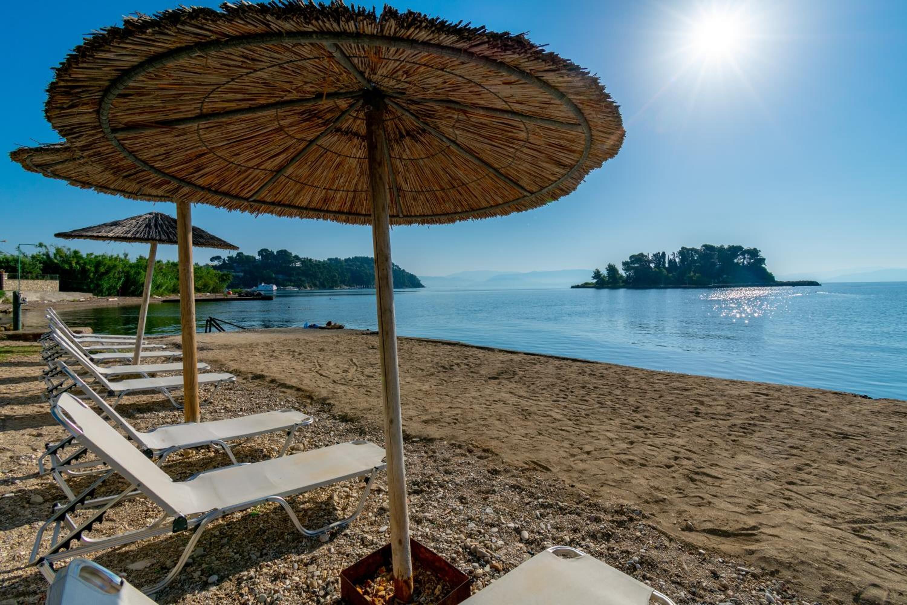 Private beach nearby, sun loungers, beach umbrellas