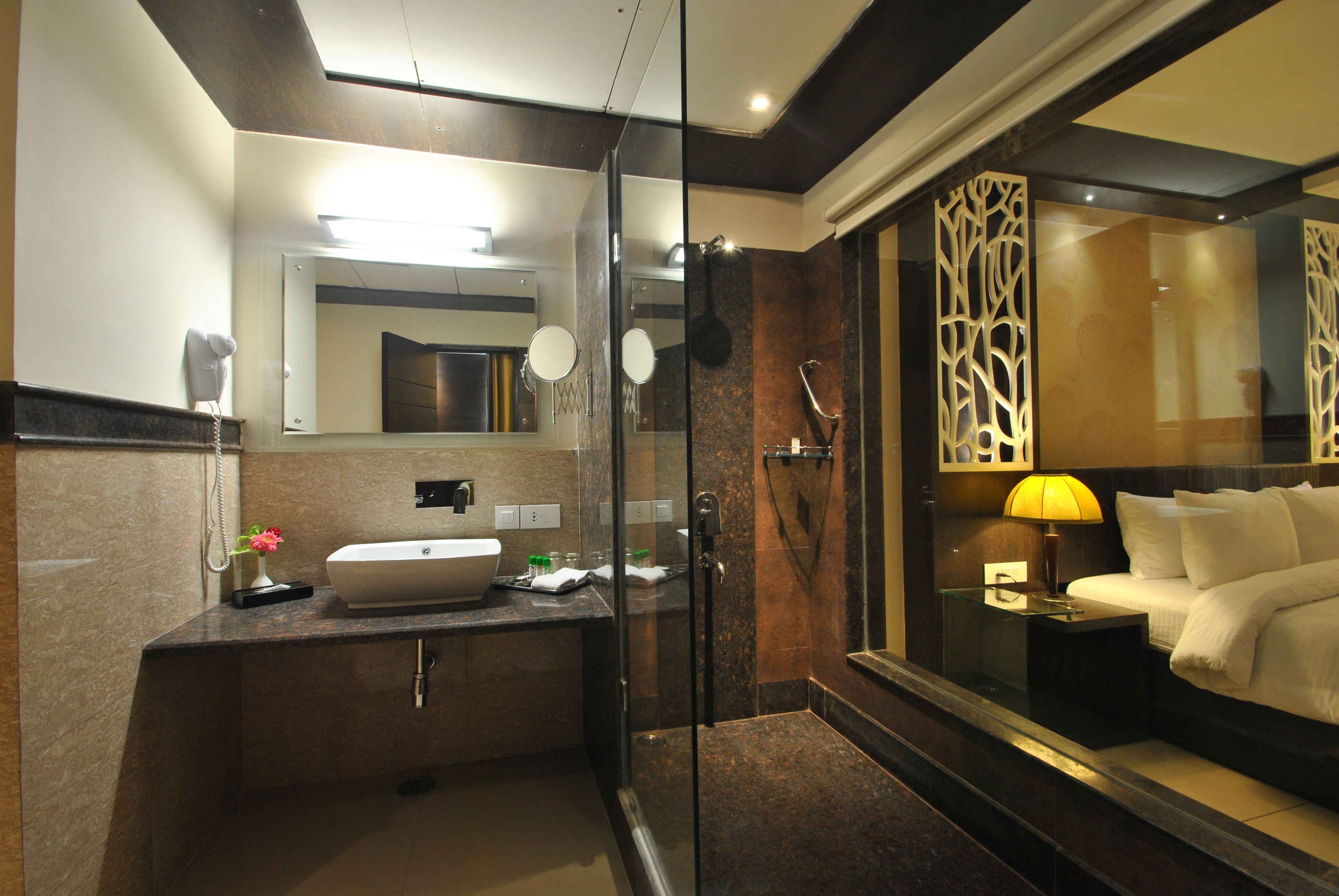 executive suite | bathroom | designer toiletries, hair dryer, bathrobes, slippers