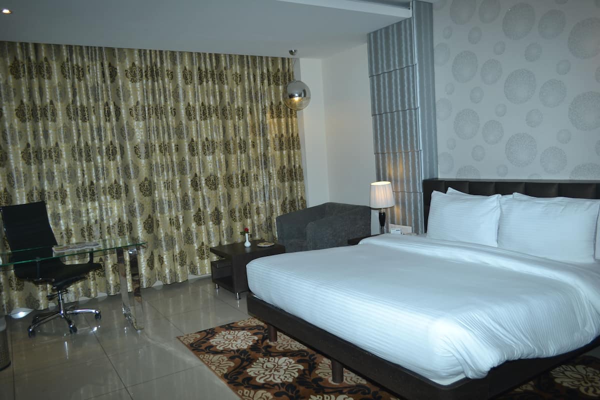 Deluxe Room | Select Comfort beds, in-room safe, individually decorated