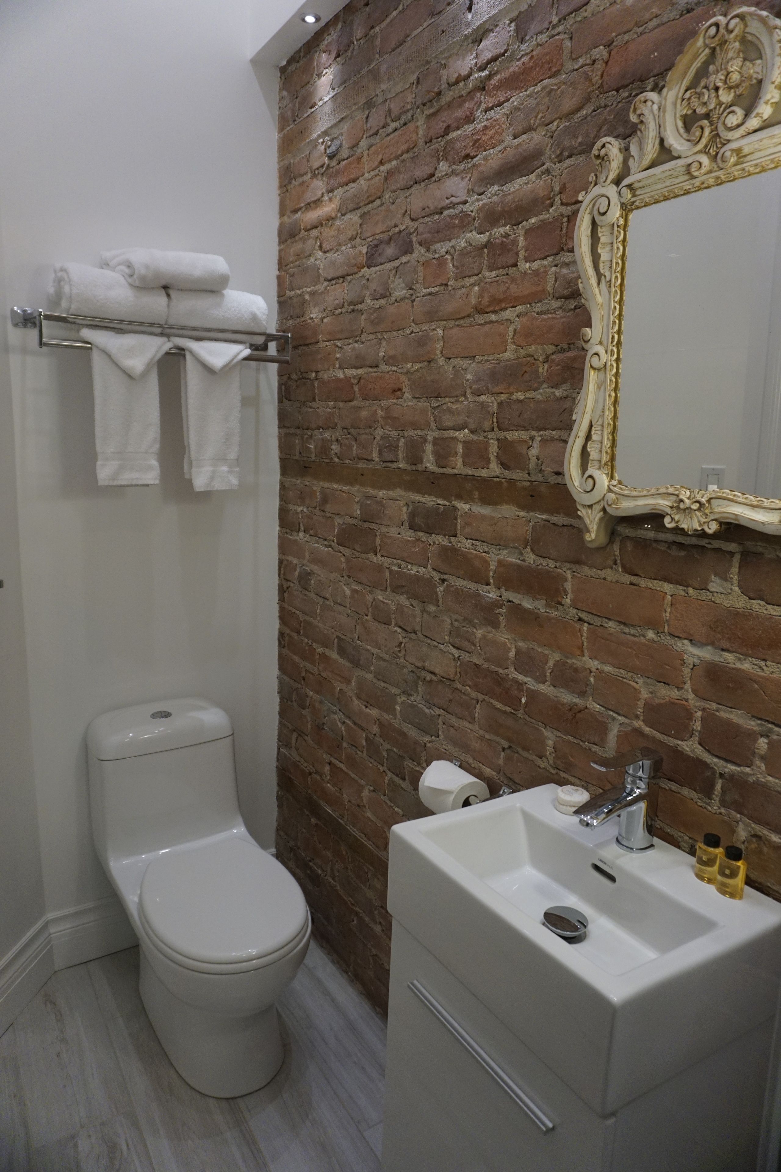 single guest small economy room, 1 double bed, private bathroom in hallway. | bathroom | hair dryer, towels, soap, shampoo