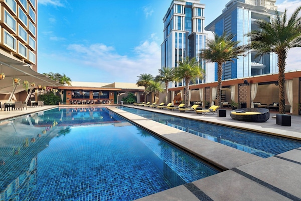 Outdoor pool, open 8:00 AM to 7:00 PM, pool umbrellas, sun loungers