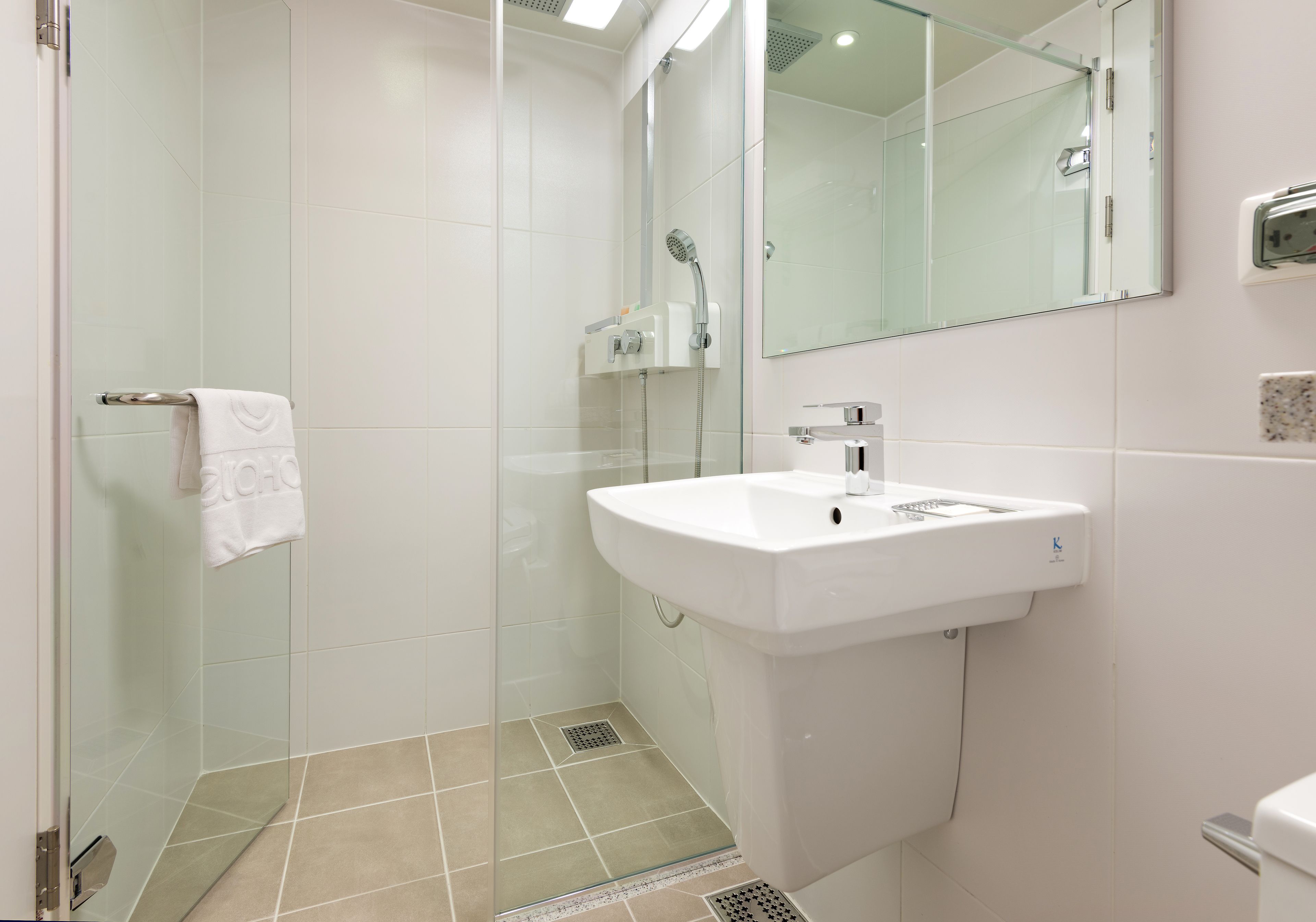 hair dryer, bathrobes, slippers, bidet