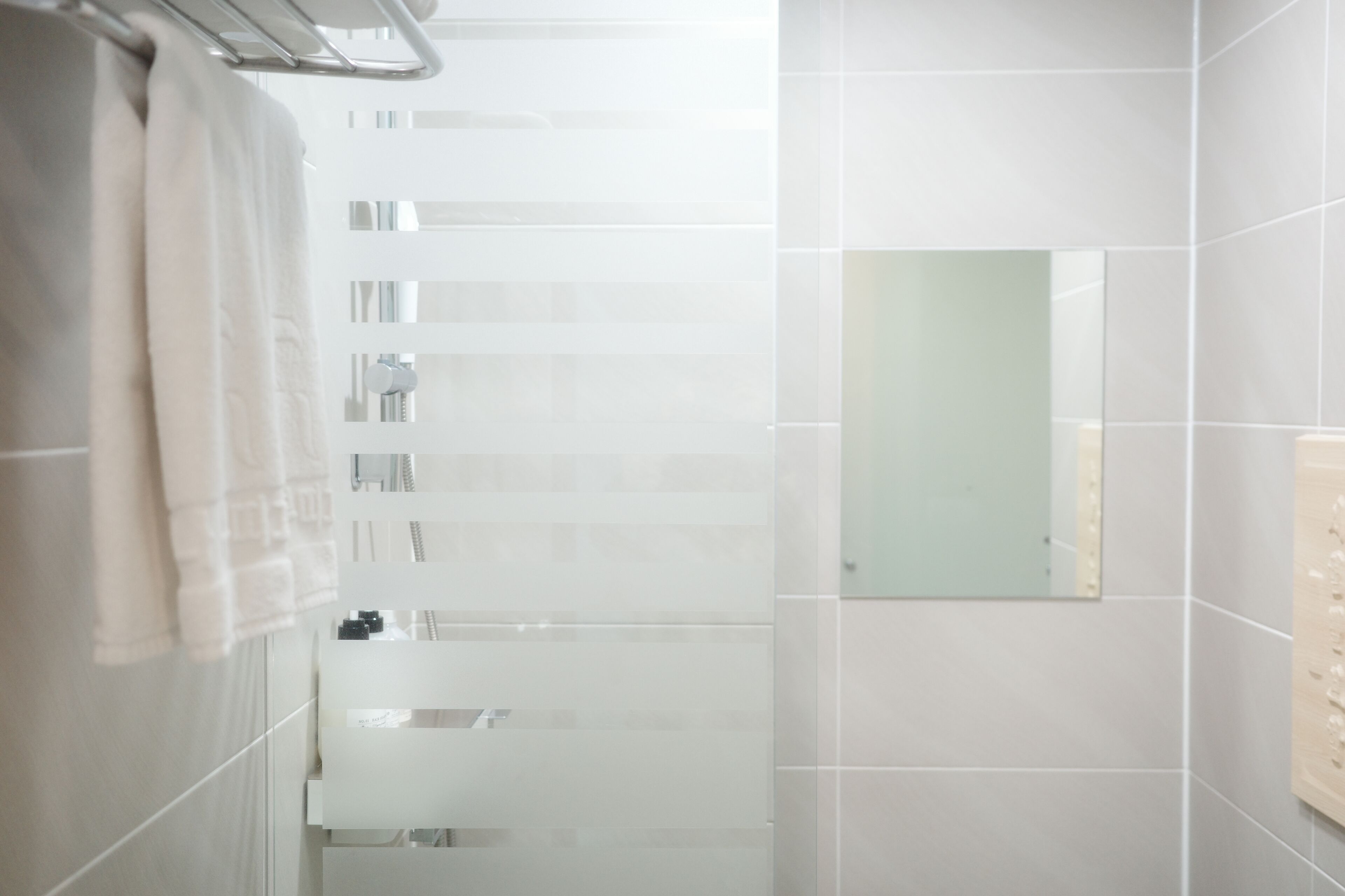 deluxe twin room | bathroom | hair dryer, bathrobes, bidet, towels