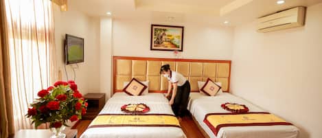 1 habitación, cubrecamas, minibar y caja de seguridad en la habitación