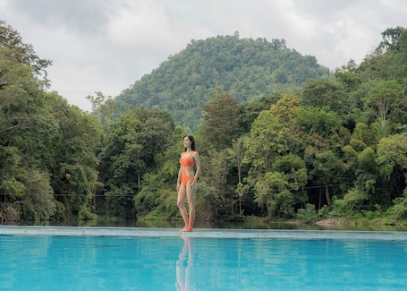 Outdoor pool, open 10:00 AM to 7:30 PM, pool umbrellas, sun loungers. Home Phutoey River Kwai Hotspring & Nature Resort