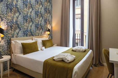 1 habitación, ropa de cama de alta calidad, cubrecamas y minibar