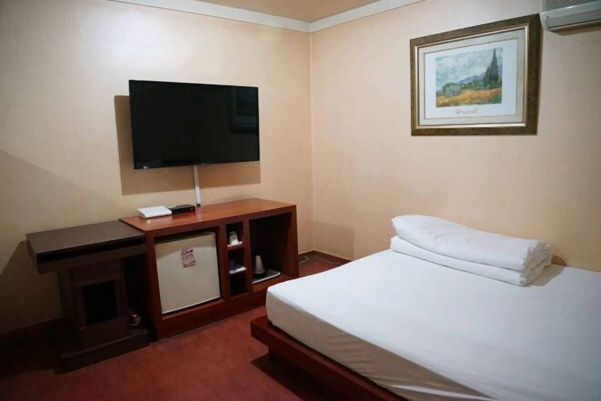 Premium bedding, soundproofing, rollaway beds (surcharge), WiFi (free)