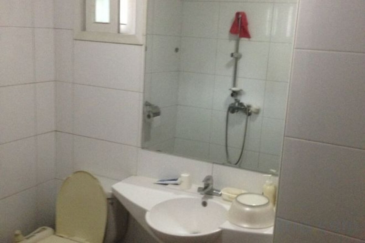 Bathroom | Deep soaking tub, free toiletries, hair dryer, slippers