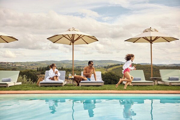 Outdoor pool, pool umbrellas, pool loungers