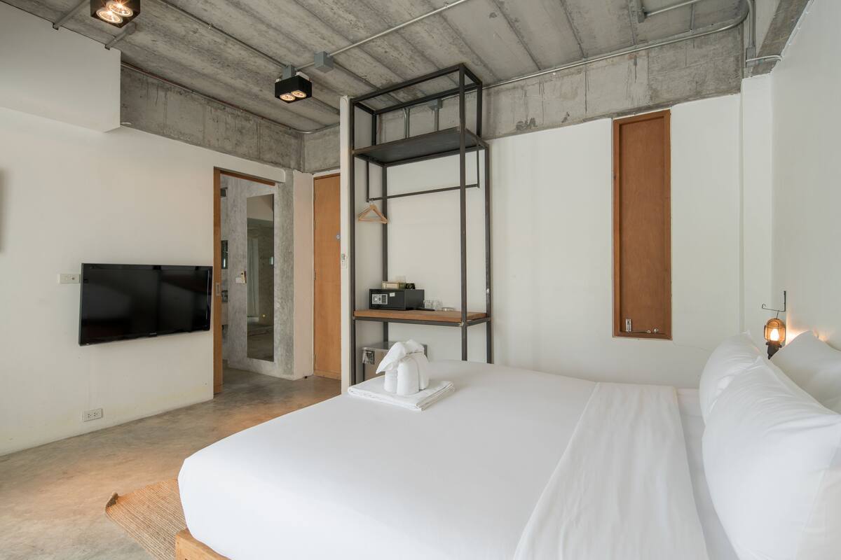 Habitación Deluxe | Minibar, caja fuerte, wifi gratis y ropa de cama
