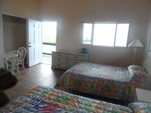 Deluxe Room, 2 Double Beds, Sea View | In-room safe, blackout curtains, bed sheets - Greenwich Creek Lodge (Deadmans Cay)