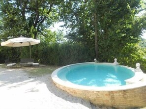 Seasonal outdoor pool, pool umbrellas, pool loungers