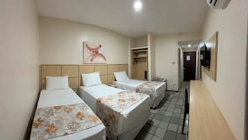 Standard Triplo | Minibar, blackout curtains, free WiFi, bed sheets