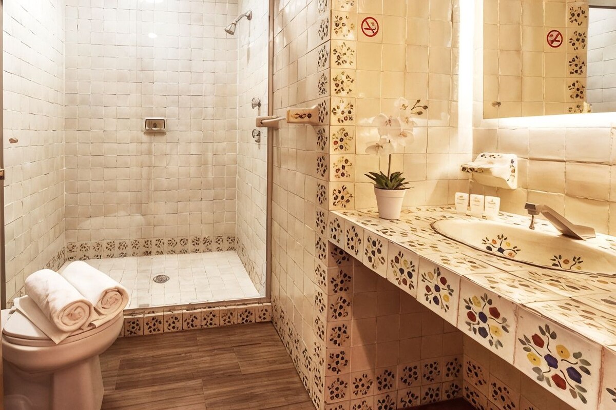 Bathroom | Shower, free toiletries, hair dryer (on request), towels