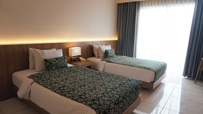 Deluxe Double or Twin Room, Balcony | Minibar, desk, laptop workspace, iron/ironing board - Tusita Boutique Hotel (Kuta)